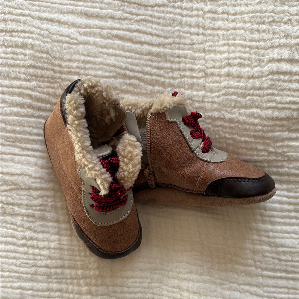 Brown and Gray Fur-Lined Boots with Red Laces